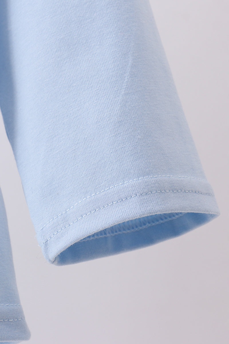 Blue construction embroidery top