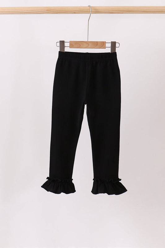 Black ruffle pants